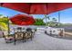 Outdoor dining area with a grill, seating, and a fire pit, ideal for enjoying meals and gatherings outdoors at 8132 W Hatfield Rd, Peoria, AZ 85383