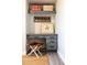 Charming office nook with grey cabinets and a unique wooden stool at 8132 W Hatfield Rd, Peoria, AZ 85383