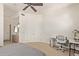 Bright bedroom with a desk area, double closets, and access to the bathroom at 8270 N Hayden Rd # 2041, Scottsdale, AZ 85258