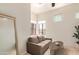 Bright living room features neutral tones, ample natural light, and comfortable modern furnishings at 8270 N Hayden Rd # 2041, Scottsdale, AZ 85258
