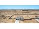 New home construction with two-car garage, concrete driveway and surrounded by a block wall enclosed yard at 9429 W Sandstone Mountain Dr, Casa Grande, AZ 85194