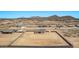 New home construction featuring block wall enclosed yards and mountain views at 9429 W Sandstone Mountain Dr, Casa Grande, AZ 85194