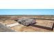 Aerial view of single-Gathering home with a walled-in yard at 9429 W Sandstone Mountain Dr, Casa Grande, AZ 85194