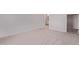 Comfortable bedroom with carpet, a doorway to the bathroom, and closet storage at 9429 W Sandstone Mountain Dr, Casa Grande, AZ 85194