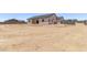 Newly constructed single-story home featuring desert landscaping and block wall at 9429 W Sandstone Mountain Dr, Casa Grande, AZ 85194
