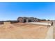 Charming single-story home featuring a spacious three-car garage and a low-maintenance desert landscape at 9429 W Sandstone Mountain Dr, Casa Grande, AZ 85194