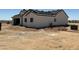 Exterior view of a new home under construction with a desert landscape at 9429 W Sandstone Mountain Dr, Casa Grande, AZ 85194