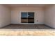Covered patio with sliding glass doors leading to the house at 9429 W Sandstone Mountain Dr, Casa Grande, AZ 85194