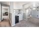 Spacious living area with plush carpeting and ample lighting for a welcoming atmosphere at 9735 W Kirby Ave, Tolleson, AZ 85353