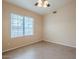 Neutral bedroom featuring tiled floors and horizontal blinds at 10722 W Irma Ln, Peoria, AZ 85373