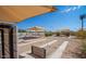 Horseshoe pits and picnic tables under shaded canopies offering an enjoyable outdoor activity at 10722 W Irma Ln, Peoria, AZ 85373