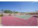 A well-maintained tennis court with ample space and lighting, perfect for recreational matches at 10722 W Irma Ln, Peoria, AZ 85373
