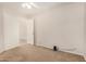 Neutral bedroom with carpet, ceiling fan, closet, and minimalist design provides a calm and inviting space at 11531 E Persimmon Ave, Mesa, AZ 85212