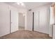 Neutral bedroom with carpet, ceiling fan, closet, and natural light provides a calm and inviting space at 11531 E Persimmon Ave, Mesa, AZ 85212