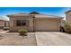 Charming single-story home featuring a tile roof and a two-car garage at 11531 E Persimmon Ave, Mesa, AZ 85212