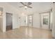 Open living space with tile flooring, lots of natural light and neutral paint at 11531 E Persimmon Ave, Mesa, AZ 85212