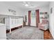 Lovely Bedroom featuring ample light, neutral decor and a plush rocking chair at 1233 E El Camino Dr, Phoenix, AZ 85020