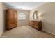 Cozy bedroom features natural lighting, neutral walls, and a spacious closet at 12712 W Milton Dr, Peoria, AZ 85383