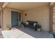 Charming front porch with seating and decorative plants, offering a welcoming entrance at 12712 W Milton Dr, Peoria, AZ 85383