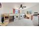 Playful bedroom with a fun loft bed, neutral carpet, ceiling fan, and plenty of space for activities at 12810 N 20Th St, Phoenix, AZ 85022