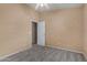 Neutral bedroom featuring doorway and carpet flooring at 13861 W Elm St, Surprise, AZ 85374