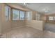 Bright open living space with large windows providing ample natural light and neutral colors at 13861 W Elm St, Surprise, AZ 85374