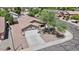 Aerial view of the home with a well-manicured yard and two car garage at 16538 N Oachs Dr, Surprise, AZ 85374