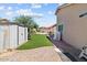 Backyard showing the outdoor seating, and garden with shed for extra storage at 16538 N Oachs Dr, Surprise, AZ 85374