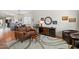 Spacious living room with stylish furniture, hardwood floors, and an open layout at 16538 N Oachs Dr, Surprise, AZ 85374