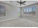 Bright bedroom with plantation shutters and ample natural light at 16881 W Merrell St, Goodyear, AZ 85395