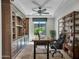 Comfortable home office with custom built-ins and modern furnishings at 16881 W Merrell St, Goodyear, AZ 85395