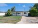Charming single-story home with well-maintained front yard and covered porch at 1717 W Roma Ave, Phoenix, AZ 85015
