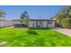 Charming single-story home with a well-manicured lawn and inviting curb appeal at 1717 W Roma Ave, Phoenix, AZ 85015