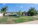Lovely home with a green lawn and a covered entrance at 1717 W Roma Ave, Phoenix, AZ 85015