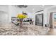 Contemporary kitchen with granite countertop, and white cabinets and stainless appliances at 1717 W Roma Ave, Phoenix, AZ 85015