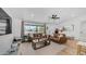 Bright living room with hardwood floors, leather sofas and plenty of natural light at 1717 W Roma Ave, Phoenix, AZ 85015