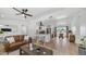 Inviting living space flows into a modern kitchen with a breakfast bar at 1717 W Roma Ave, Phoenix, AZ 85015