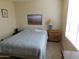 Comfortable bedroom with natural light and neutral decor at 20282 N 104Th Ave, Peoria, AZ 85382