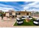 An outdoor living space featuring a patio and lounge area offers a relaxing atmosphere for entertaining guests at 2130 W Colter St, Phoenix, AZ 85015