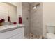 Updated bathroom with updated tile shower and vanity at 2130 W Colter St, Phoenix, AZ 85015
