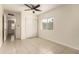 This spacious bedroom features a closet, window and neutral walls at 2130 W Colter St, Phoenix, AZ 85015