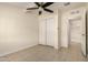 Neutral bedroom with closet and ceiling fan at 2130 W Colter St, Phoenix, AZ 85015