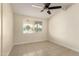 Neutral bedroom with ceiling fan and natural light at 2130 W Colter St, Phoenix, AZ 85015
