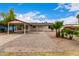 Charming single-story home featuring a covered carport and low-maintenance desert landscaping at 2130 W Colter St, Phoenix, AZ 85015