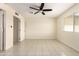 Large main bedroom with neutral walls, tile floors and natural light at 2130 W Colter St, Phoenix, AZ 85015