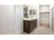 Modern bathroom with double vanity sinks and shower at 24047 W Cocopah St, Buckeye, AZ 85326