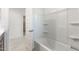 Bright bathroom featuring a bathtub and natural light at 24047 W Cocopah St, Buckeye, AZ 85326