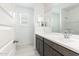 Bright bathroom with vanity and good lighting at 24047 W Cocopah St, Buckeye, AZ 85326