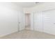 Bright bedroom with a closet and neutral carpet at 24047 W Cocopah St, Buckeye, AZ 85326