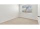 Bright bedroom with natural light coming through the window, carpeted flooring at 24047 W Cocopah St, Buckeye, AZ 85326